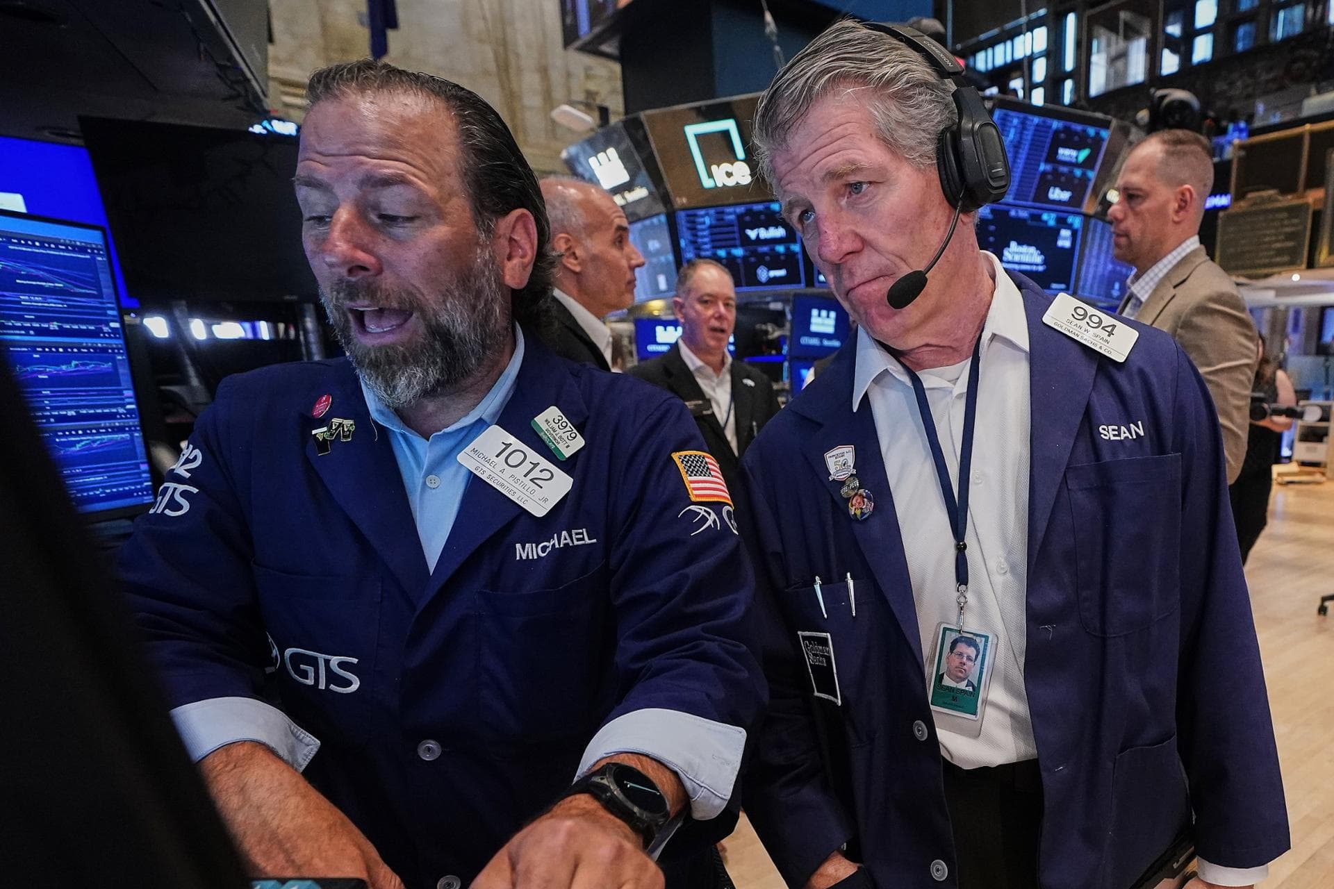 Nasdaq, S&P 500 slip while Dow hits record high